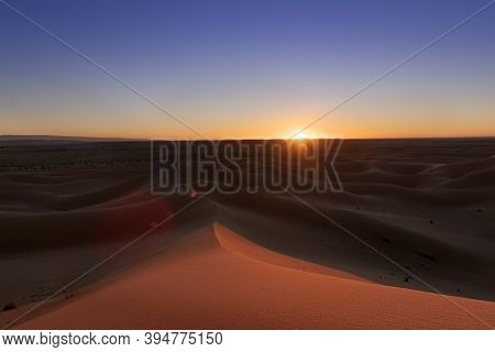 Huge Desert Dunes Of Erg Chigaga, At The Gates Of The Sahara, At Sunset. Morocco. Concept Of Travel