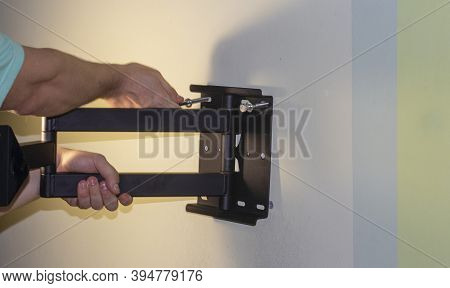 Attaching Of The Mount To The Wall.