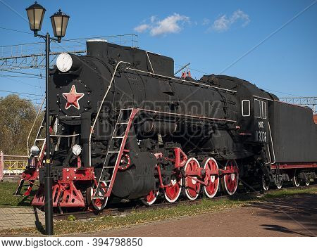 Old Locomotive With Wagons At Skuratovo Railway Station.