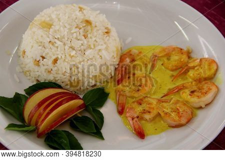 Prado, Bahia / Brazil - October 20, 2012: Grilled Vm Prawns, Topped With Curry Sauce, With Pineapple