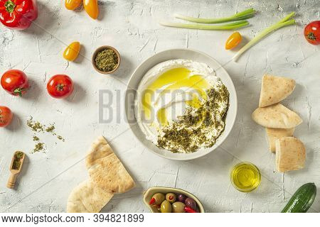 Popular Middle Eastern Appetizer Labneh Or Labaneh, Soft White Goat Milk Cheese With Olive Oil, Hyss