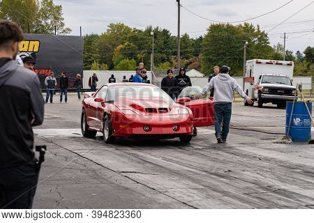 Milan, Michigan / Usa - 10-03-2020: Drivers Testing Their Cars At A Test And Tune Event That Is Open