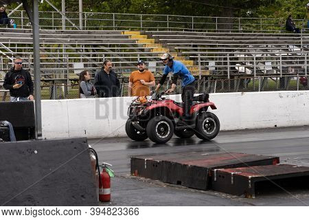 Milan, Michigan / Usa - 10-03-2020: Drivers Testing Their Cars At A Test And Tune Event That Is Open