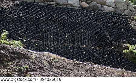 Selective Focus, Abstract Premises Of The Security Concept. Strengthening The Mountain Slope With An