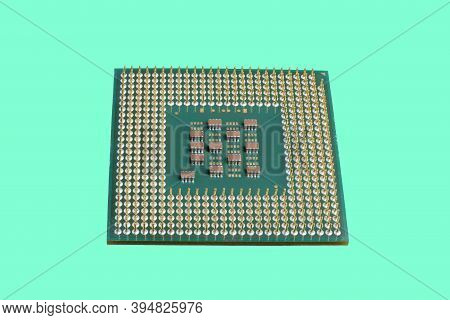 Photo Of A Cpu Chip Isolated Against The Background Of Aqua Menthol. Microprocessor, Central Process