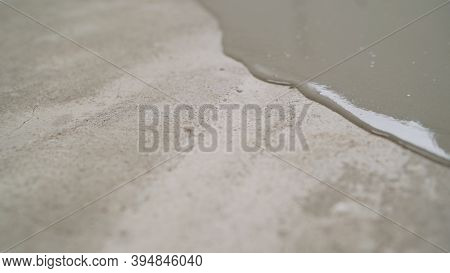 Self-leveling Floor In The New Room. A New Self-leveling Floor Is Poured Into The Room