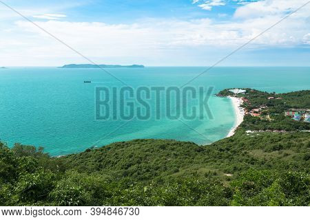 Aerial View From Thailand's Koh Larn Overlooking The Community And The Beaches With The Sea During T