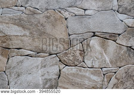 A Close-up Texture Of An Old Light Brick Stone