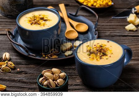 Vegetarian Cream Soup With Corn, Pistachios And Croutons. Banner, Catering Menu Recipe. Top View.