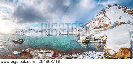 Fabulous Winter Scenery With Lots Of Snow  In Small Fishing Village And Snowy  Mountain Peaks Near V