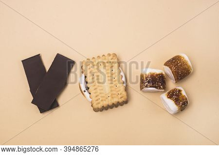 Freshly Toasted Smore With Marshmallow And Chocolate On Yellow Background Ingredients For Smores Top