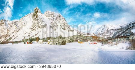 Gorgeous Winter Scenery With Traditional Norwegian Wooden Houses And Pine Trees Near Valberg Village
