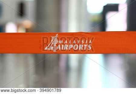 Sepang, Selangor, Malaysia - Mart 17, 2019: Close Up Of Orange Tape With Malaysia Airport Inscriptio