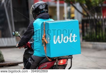 Athens, Greece. Nov 12, 2020. Wolt Courier With Motor Scooter, Rear View. Food Delivery Service