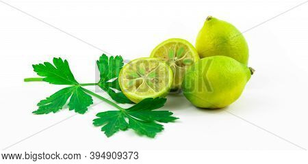 Illustrative Photo Of Limequat, Beautiful Composition With Greens, Banner, On A White Isolated Backg