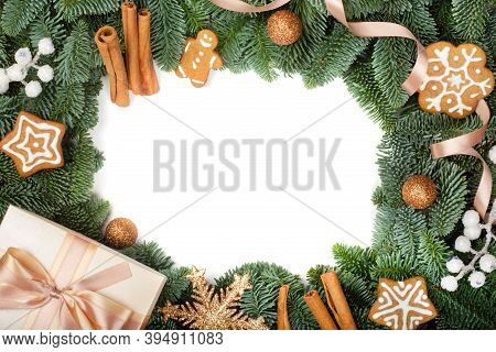 Christmas Design Boder Frame Greeting Card Of Noble Fir Tree Branches Gift And Gingerbread Cookies I