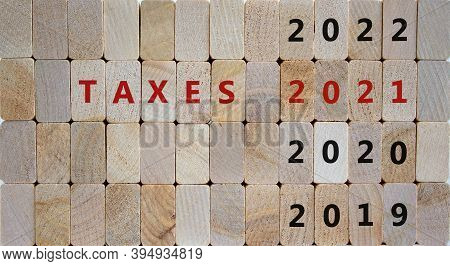 Business Concept Of Planning 2021. Wooden Blocks With The Inscription 'taxes 2021'. 2019, 2020, 2022