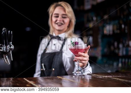 Charming Woman Barman Makes A Cocktail In The Night Club