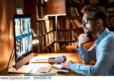Business Man Meeting Virtual Team On Video Conference Call Using Computer. Social Distance Worker Wo