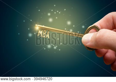Key To Your Mba Education Concept. Hand Holding Key With Text Mba. Education Is Key To Success.