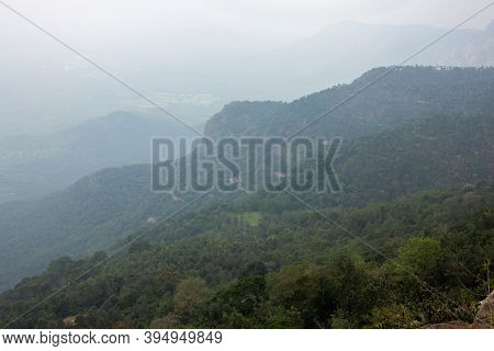 Scenic View Of The Foggy Landscape With Winding Ghat Road On The Way To Yercaud, Salem, India.
