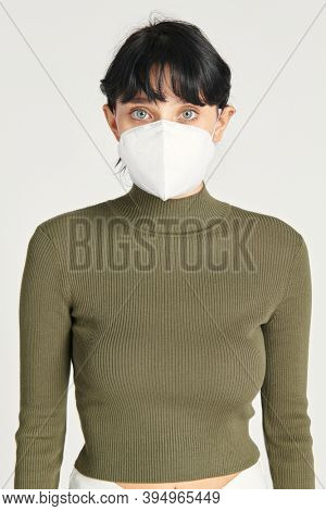 Face mask mockup on a women in a green turtleneck top