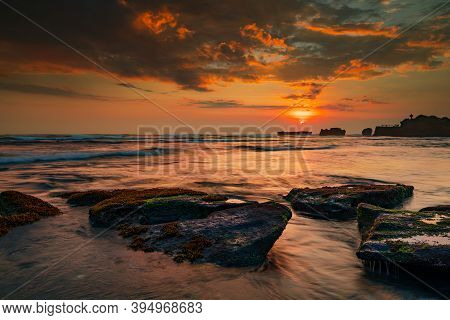 Calm Ocean Long Exposure. Stones In Mysterious Mist Of The Sea Waves. Concept Of Nature Background. 