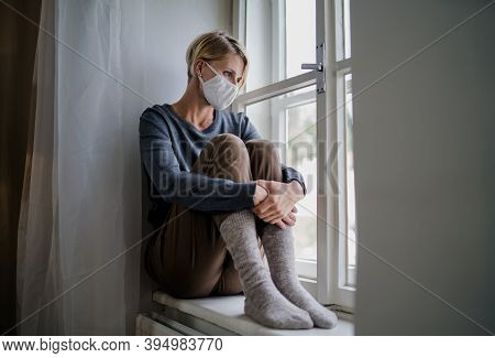 Woman Indoors At Home Feeling Stressed, Mental Health And Coronavirus Concept.