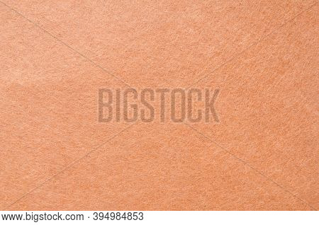Texture Background Of Dark Brown Or Orange Velvet Or Flannel Fabric