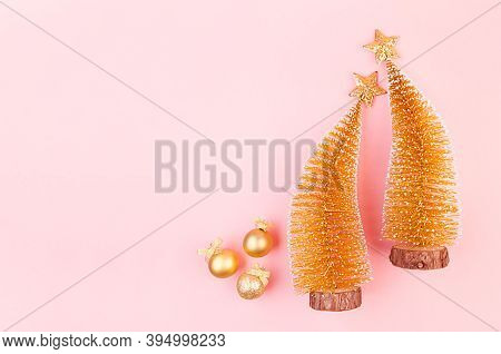 Christmas Bright And Gentle Background With Glitter Gold Decorations, Christmas Trees, Stars On Eleg