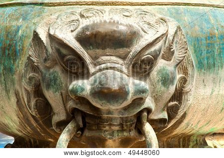 Lion's head on the incense pot
