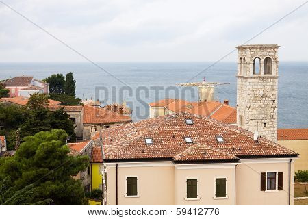 The Aerial View Of Porec City With The Adriatic Sea