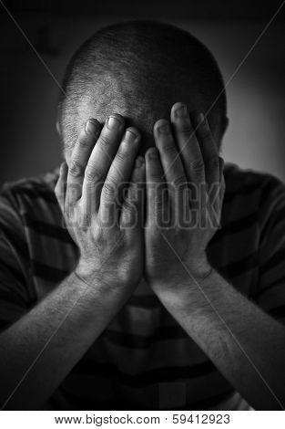 Man in depression. Black and white portrait