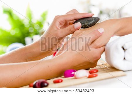 Close up of process of hand massage at beauty salon