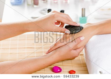 Close up of process of hand massage at beauty salon