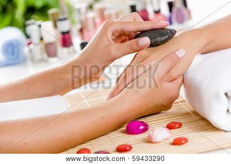 Close up of process of hand massage at beauty salon