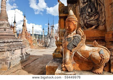 INDEIN, MYANMAR - DEC 12, 2013 Pagodas with statute and bas-relief of Indein, Inle Lake, Myanmar 