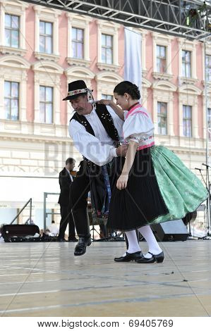 ZAGREB, CROATIA - JULY 19: Members of folk groups Nograd  from Salgotarjan, Hungary during the 48th International Folklore Festival in center of Zagreb, Croatia on July 19, 2014