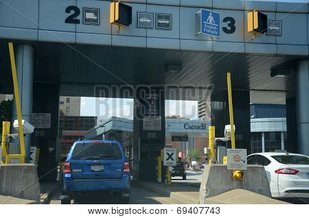 Cars Wait To Cross The Border In Windsor, Canada