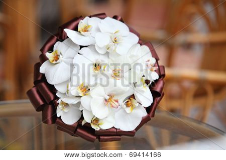 Wedding bouquet. Bouquet of fresh flowers for the wedding ceremony. Bridal bouquet from orchids