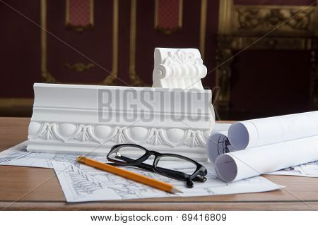 Portrait of spectacles, yellow pencil, design drawing and white