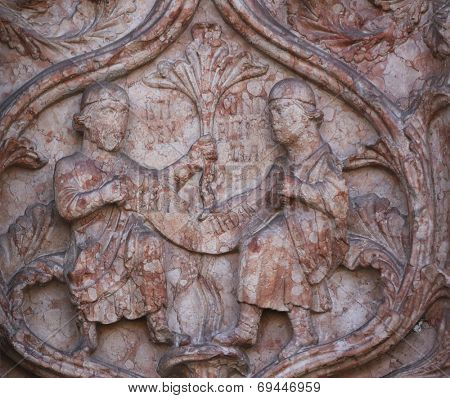 PARMA, ITALY - MAY 01, 2014: Detail of marble carvings on the baptistery from Benedetto Antelami. Baptistery in Parma is considered to be among the most important Medieval monuments in Europe. 