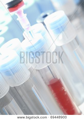 Tubes And The Syringe With The Blood