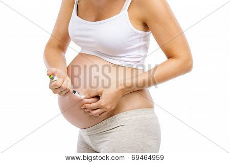 Pregnant woman with syringe