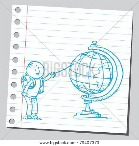 Schoolkid pointing on desk globe