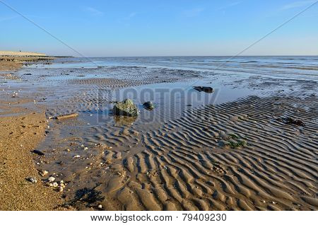 Empty beach at low tide