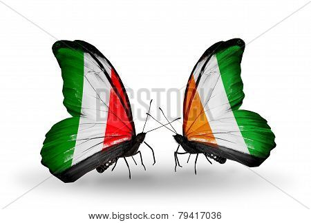 Two Butterflies With Flags On Wings As Symbol Of Relations Italy And Cote Divoire