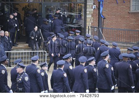 84th Precinct officers enter mortuary