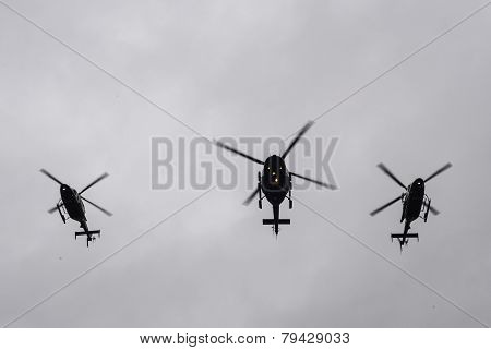 NYPD helicopters fly over in formation
