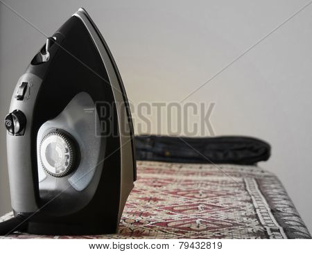 Iron on ironing board
